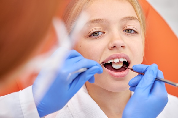Choosing Between Fluoride Treatments And Dental Sealants For Kids